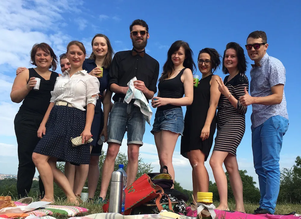 The Adison team together at an outdoor company picnic
